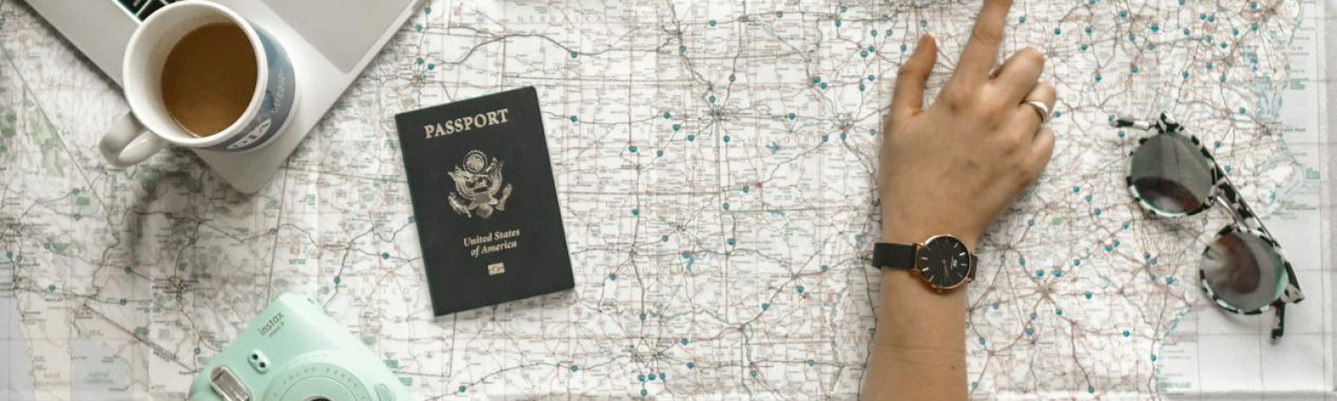 person pointing a location on the map